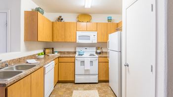 Desert Sands kitchen with plenty of cabinetry. 